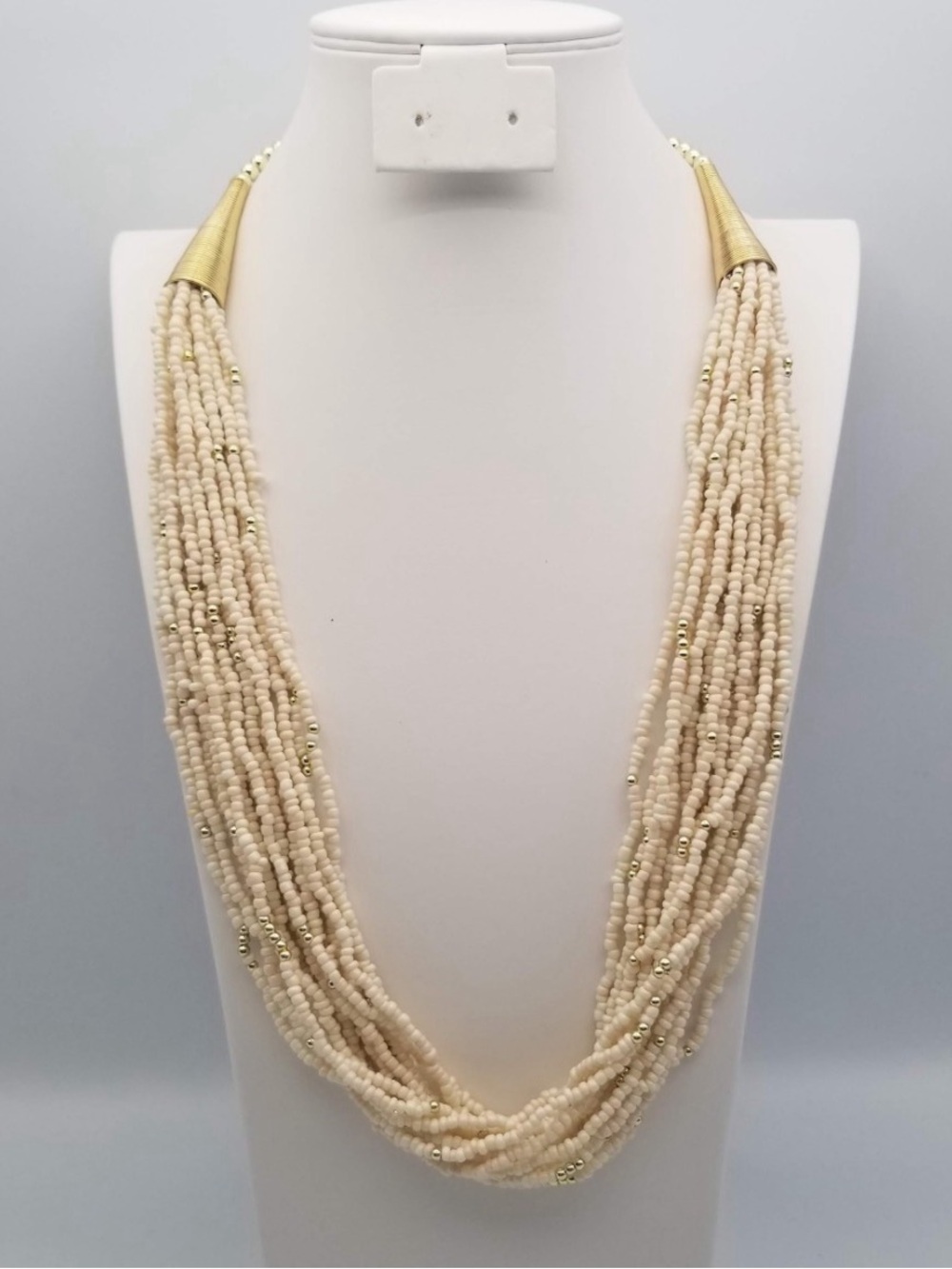 Multi-Strand Cream Bead Necklace with Gold Accents